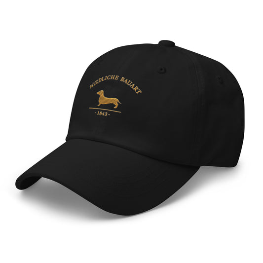Close-up of embroidered Dachshund silhouette stitched on the cap, The Loyal Mark
