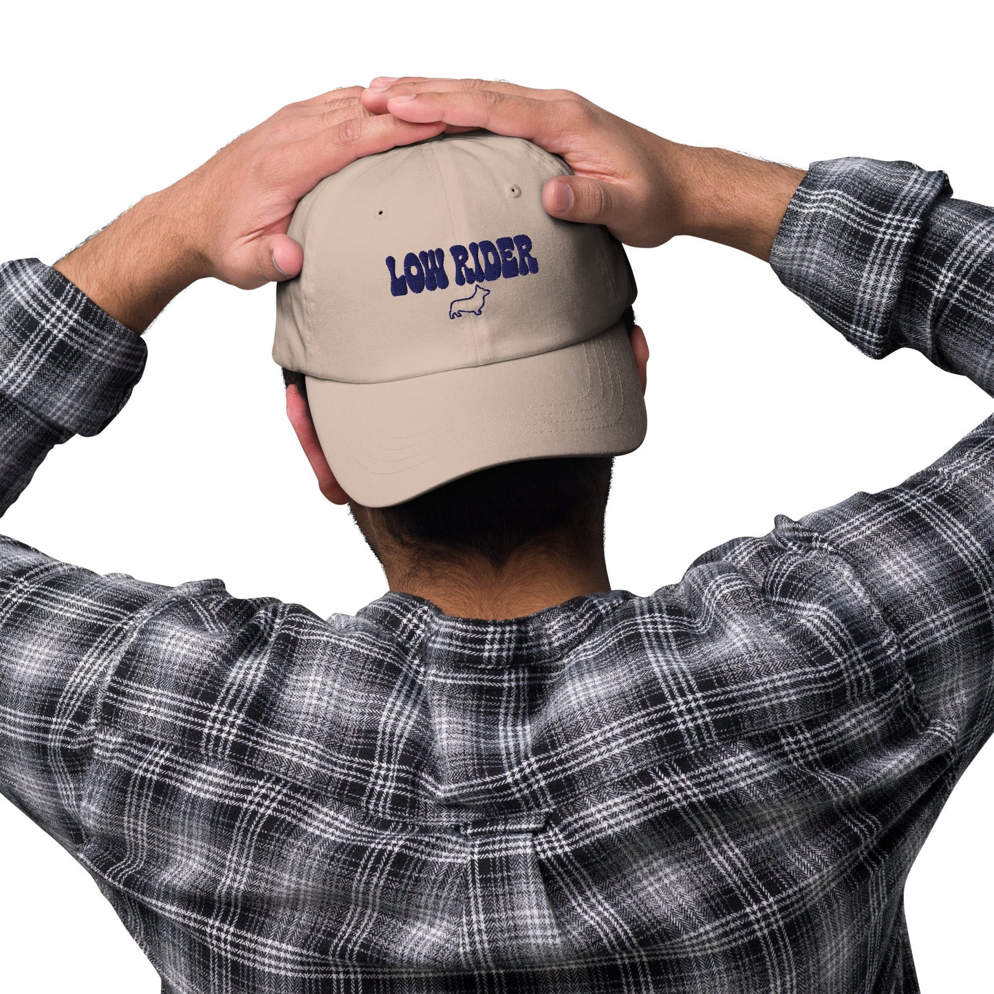 Lifestyle shot of the embroidered Corgi cap, The Loyal Mark
