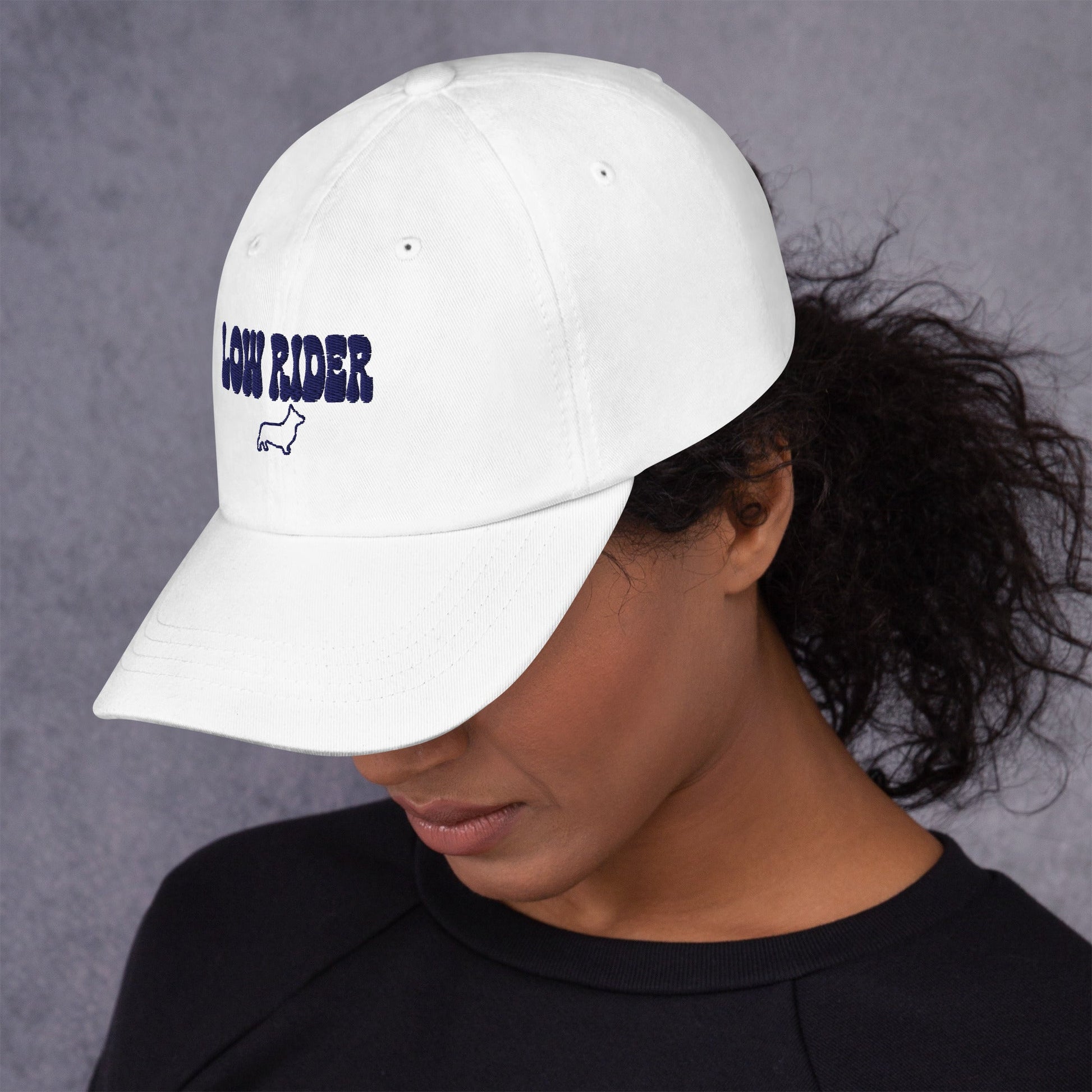 Lifestyle shot of the embroidered Corgi cap, The Loyal Mark