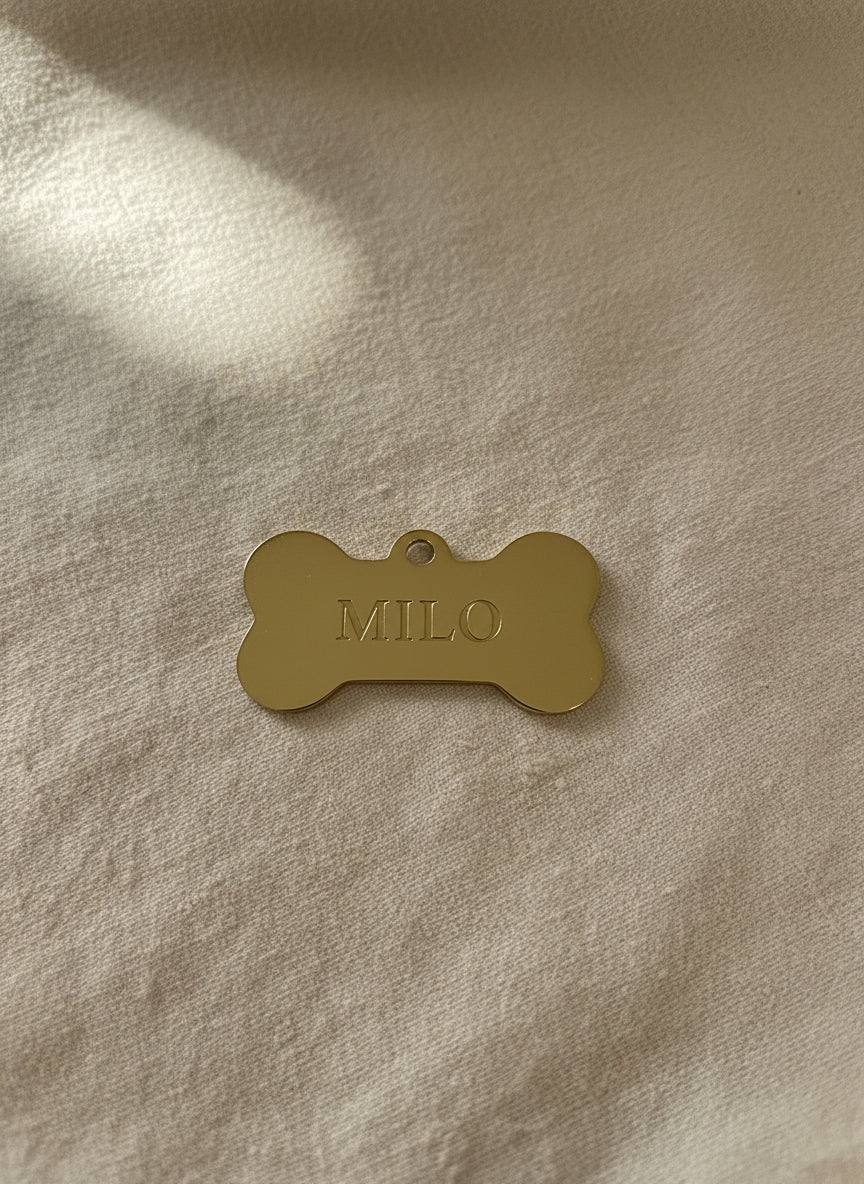 Gold-tone stainless steel bone tag