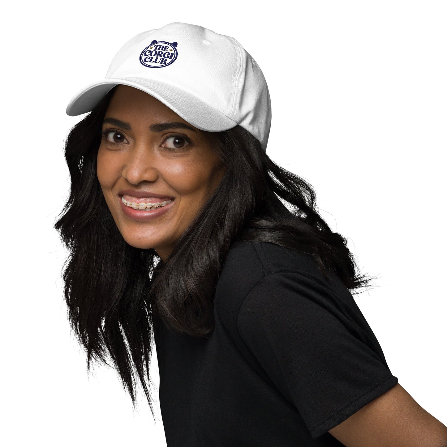 Lifestyle shot of the embroidered Corgi cap, The Loyal Mark