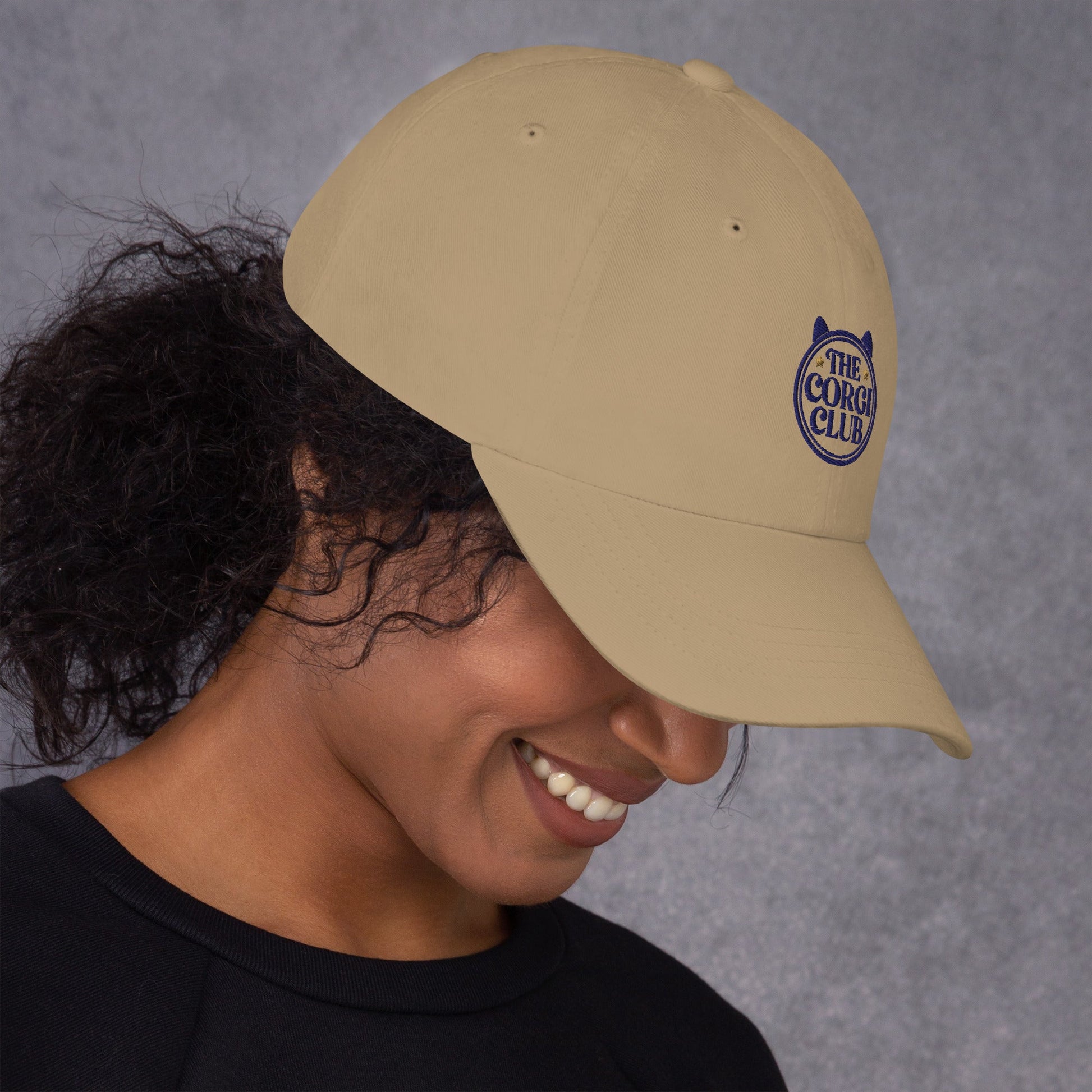 Lifestyle shot of the embroidered Corgi cap, The Loyal Mark