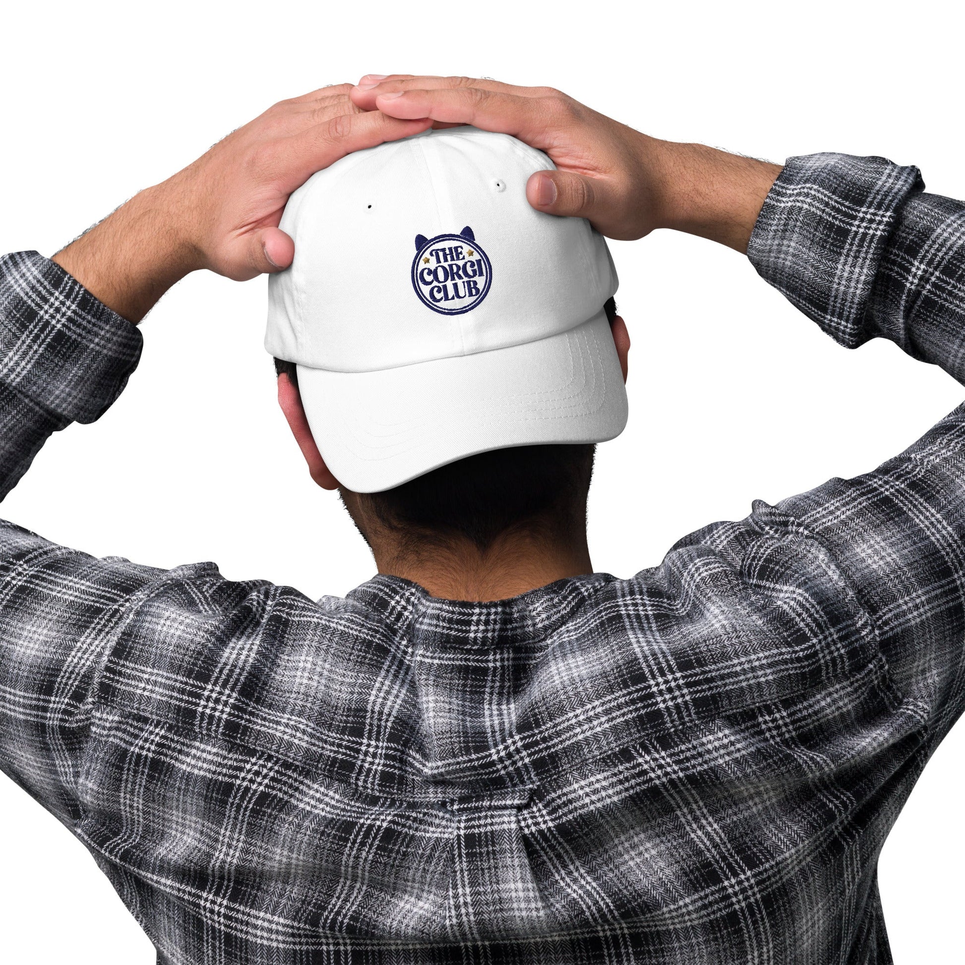 Lifestyle shot of the embroidered Corgi cap, The Loyal Mark