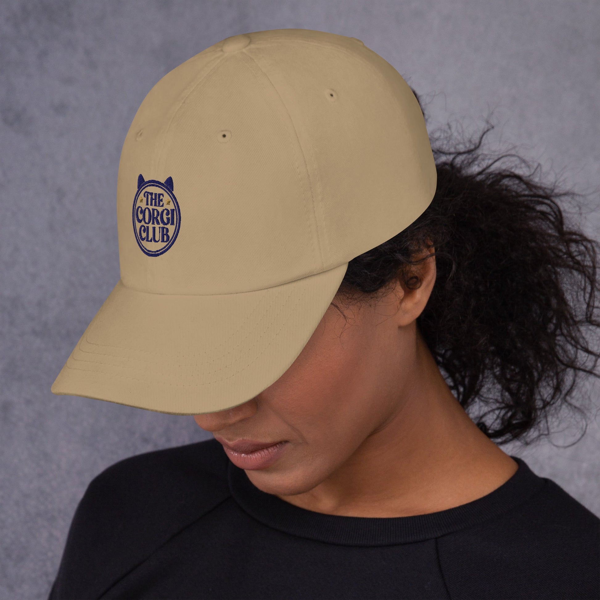 Lifestyle shot of the embroidered Corgi cap, The Loyal Mark