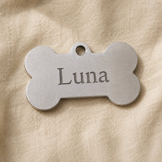 Silver bone tag engraved with Luna