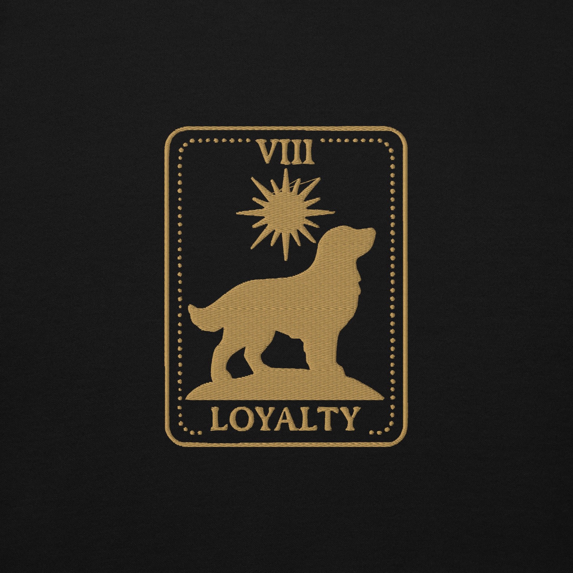 Detail shot of custom embroidered dog name on the hoodie sleeve, The Loyal Mark