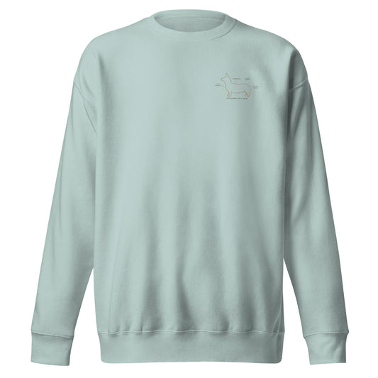 Close-up of embroidered Corgi silhouette stitched on the crewneck, The Loyal Mark